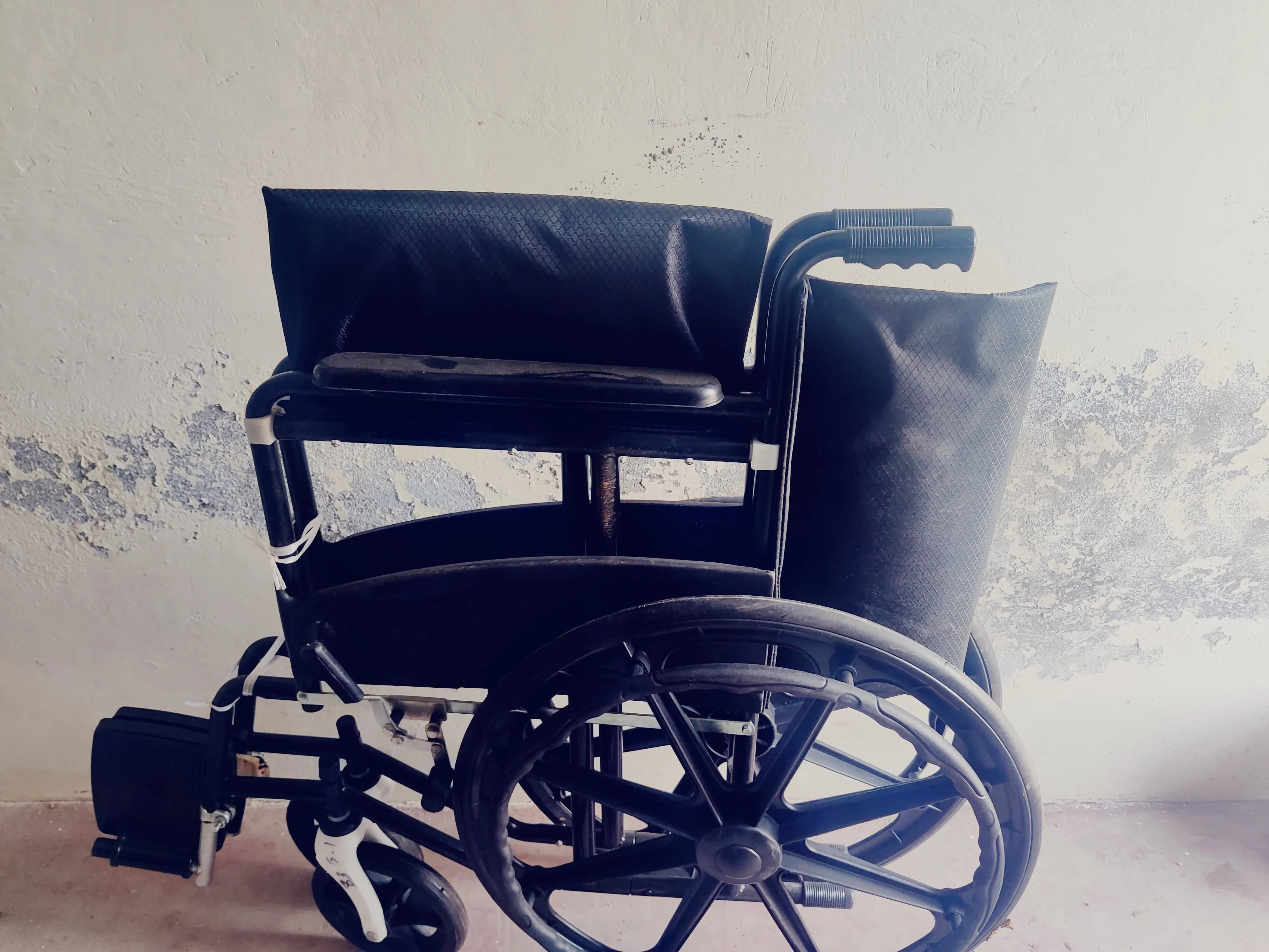 Wheelchair being transported to beneficiary