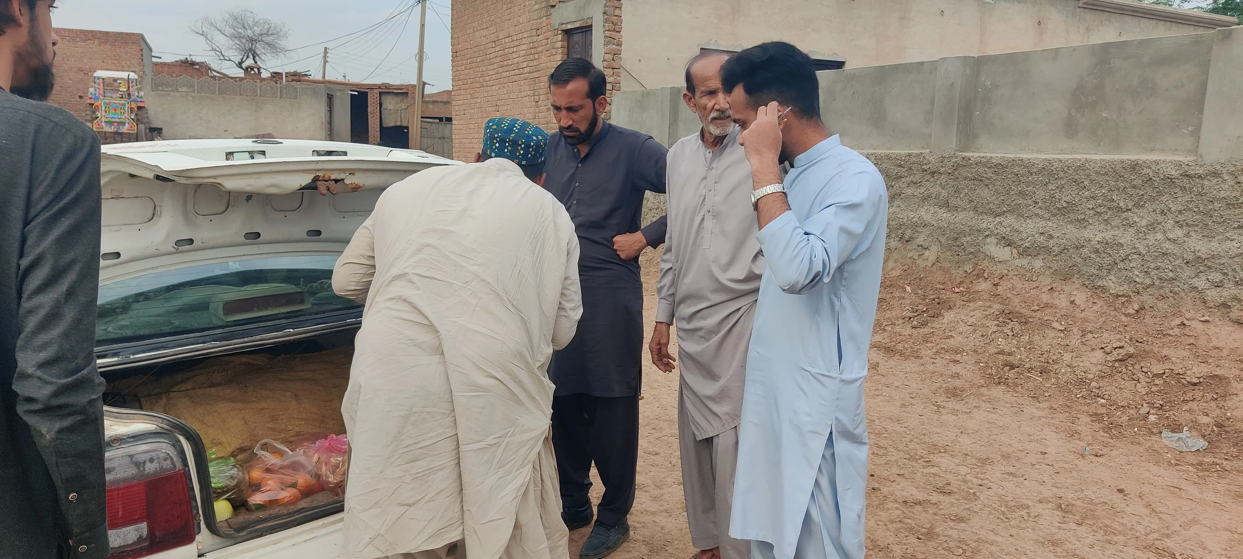 Families receiving food supplies during Ramadan